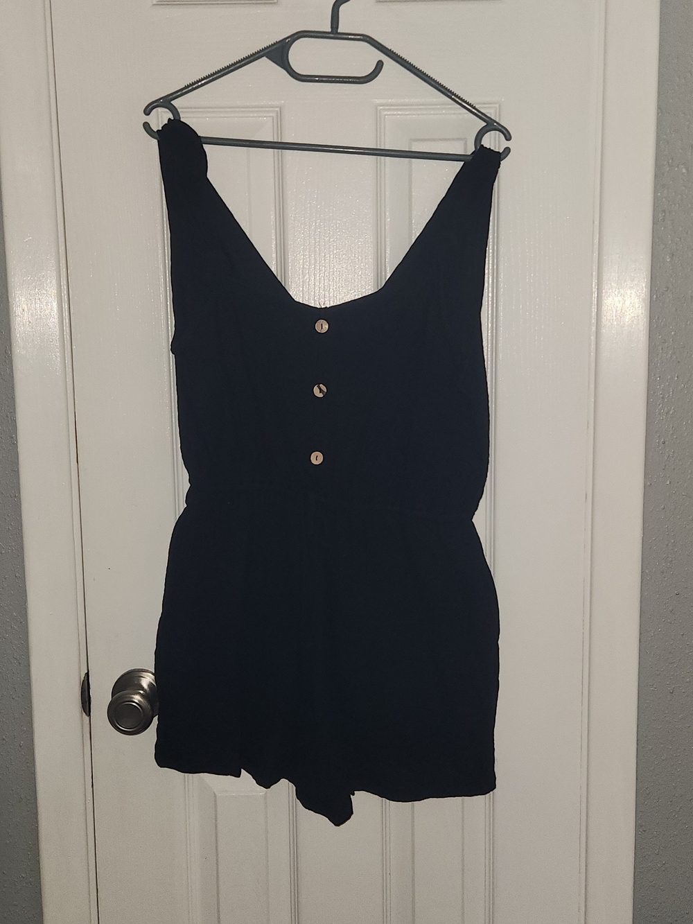 Womens Black Sleeveless Romper with Button Front